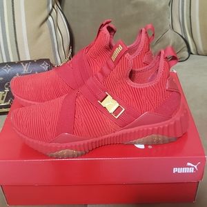 puma defy mid varsity red